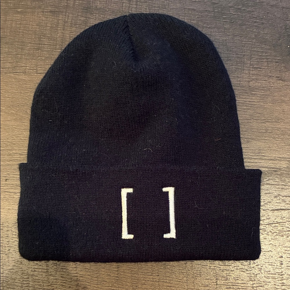 Black Knit Beanie with White Bracket Detail
